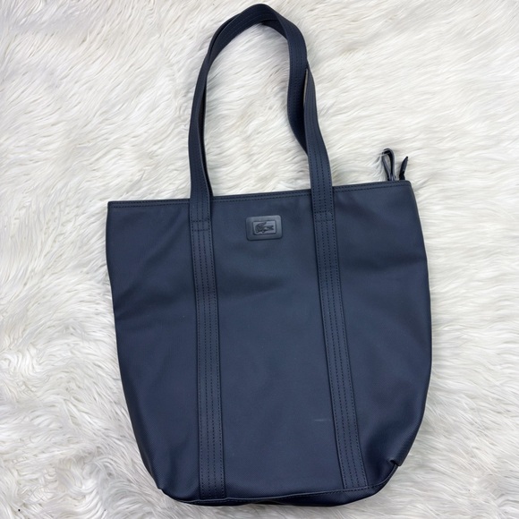 Lacoste Handbags - Lacoste Vertical Tote Bag Navy Blue Polyvinyl Chloride Zip Top